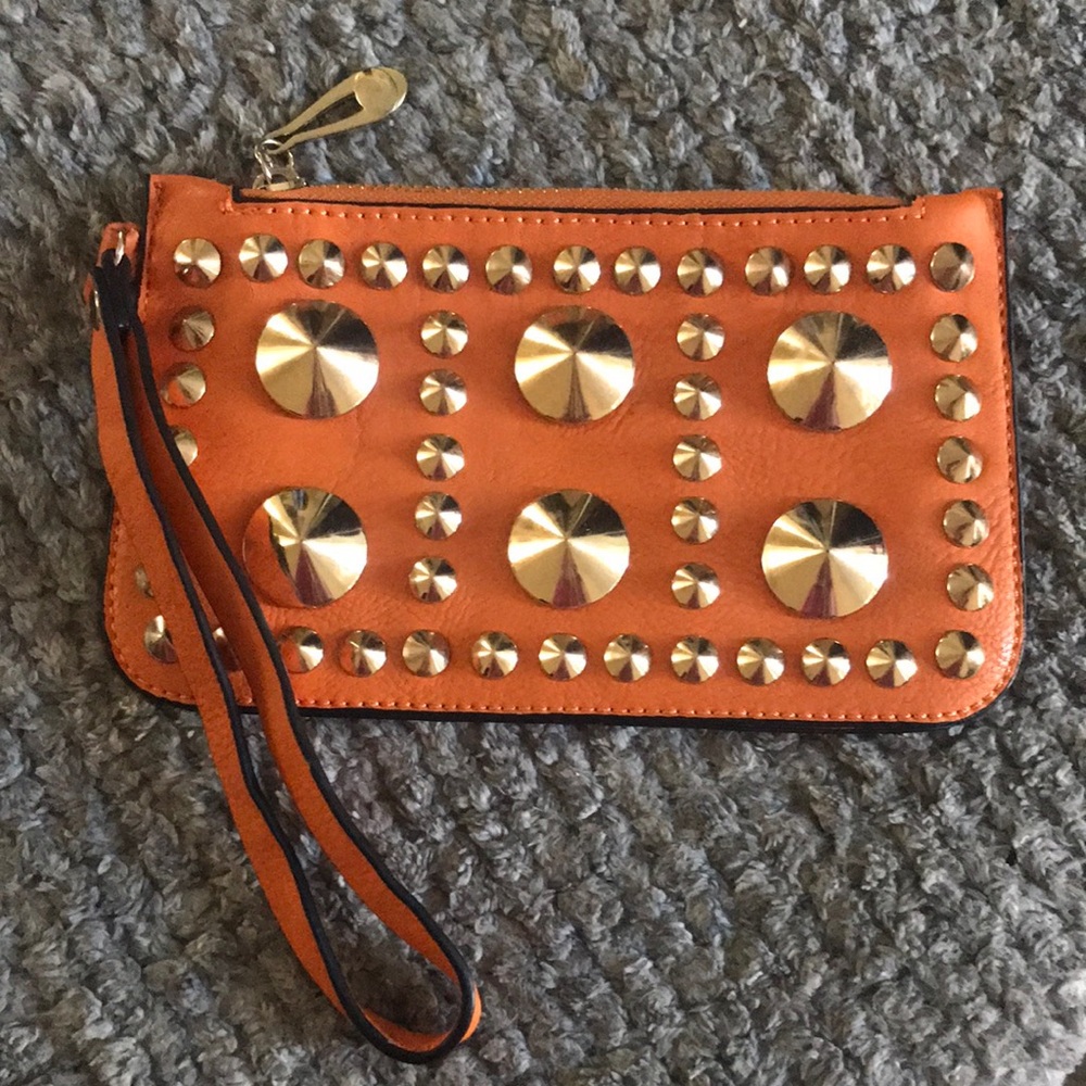 🟦Woman’s Like New Studded Orange Small Wristlet Clutch